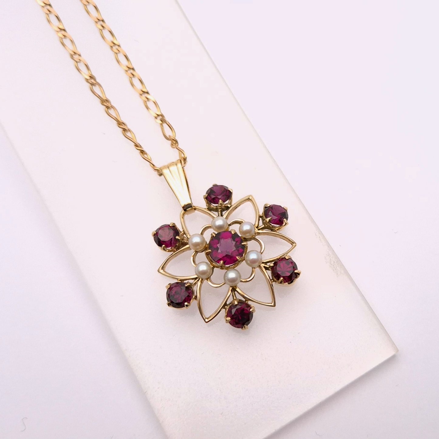 9ct Rhodolite Garnet and Pearl Star/ Flower Shaped Cut-out Pendant