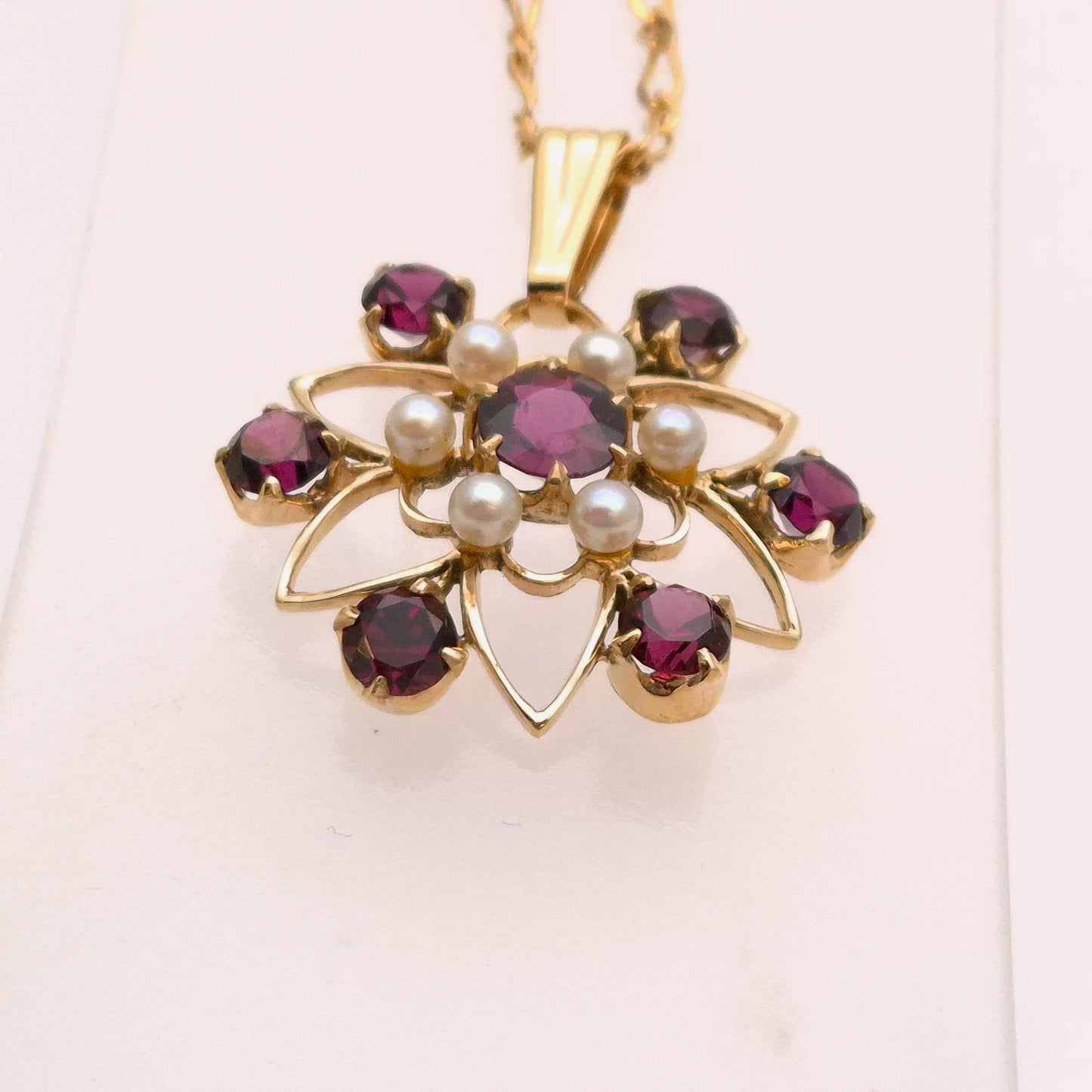 9ct Rhodolite Garnet and Pearl Star/ Flower Shaped Cut-out Pendant