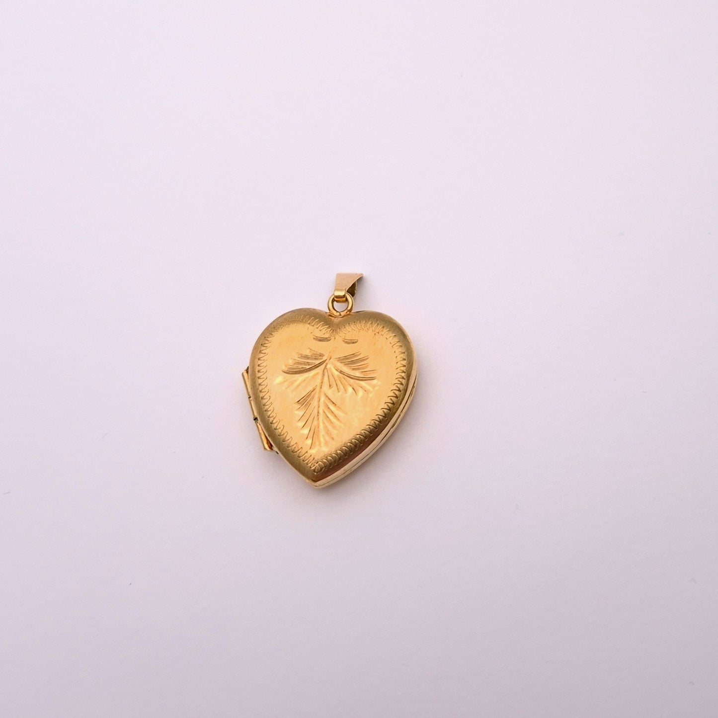 9ct yellow gold brushed effect heart shaped locket