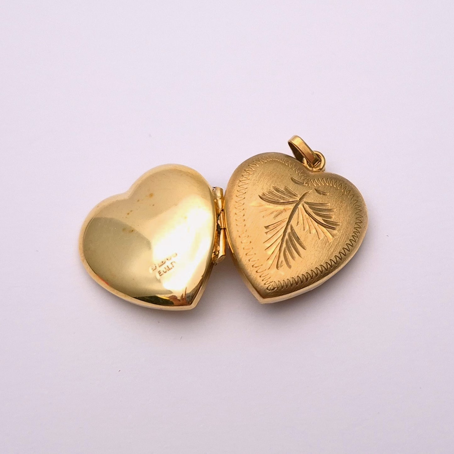 9ct yellow gold brushed effect heart shaped locket