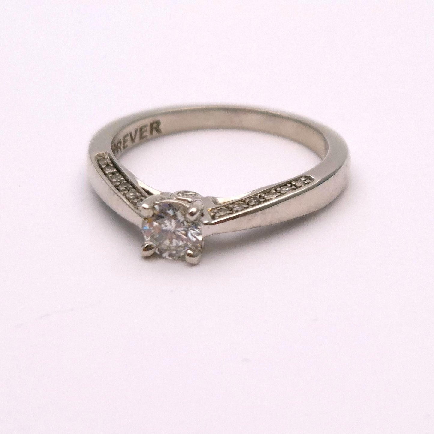 18ct White gold 0.4ct Diamond Solitaire with hidden Shoulder diamonds Ring