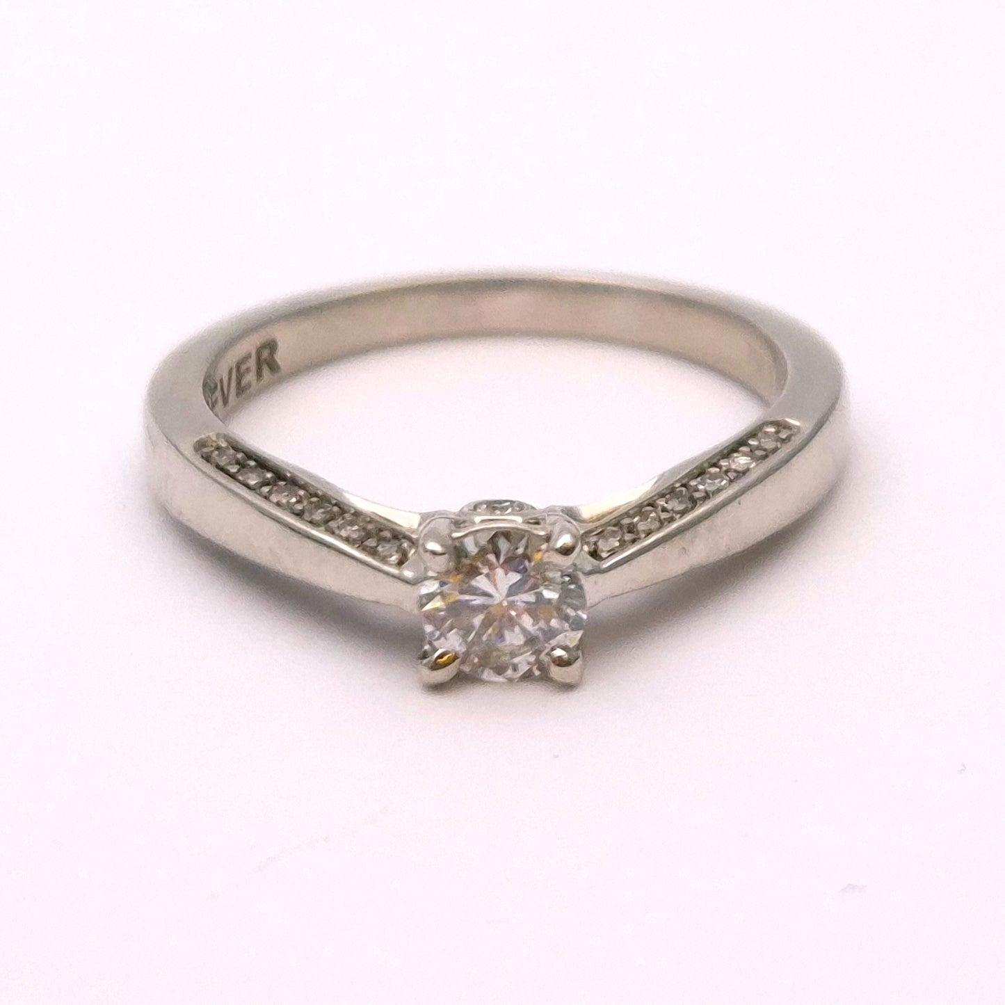 18ct White gold 0.4ct Diamond Solitaire with hidden Shoulder diamonds Ring