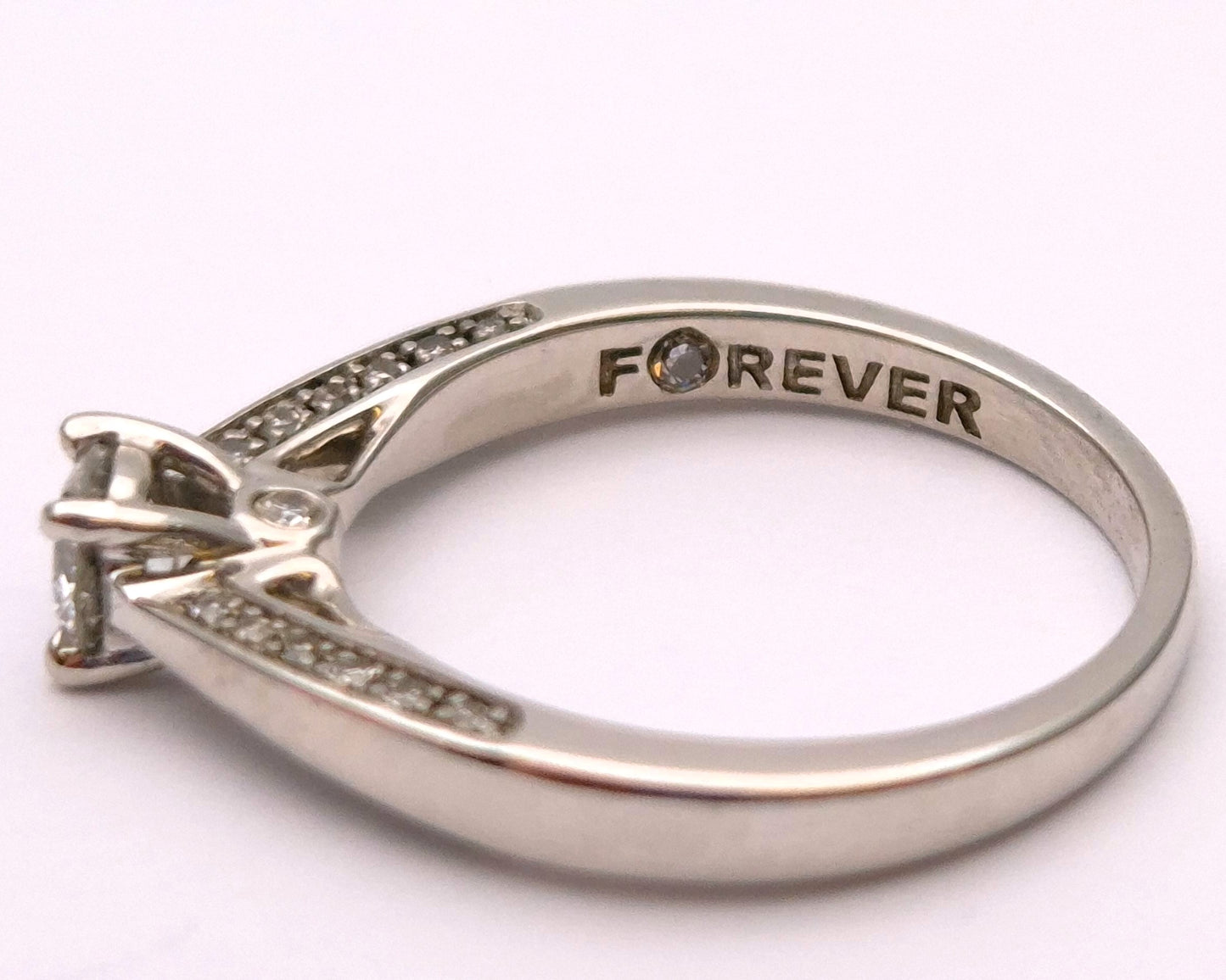 18ct White gold 0.4ct Diamond Solitaire with hidden Shoulder diamonds Ring