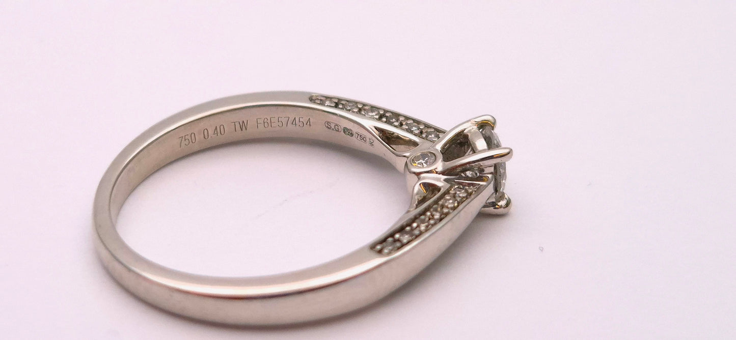 18ct White gold 0.4ct Diamond Solitaire with hidden Shoulder diamonds Ring