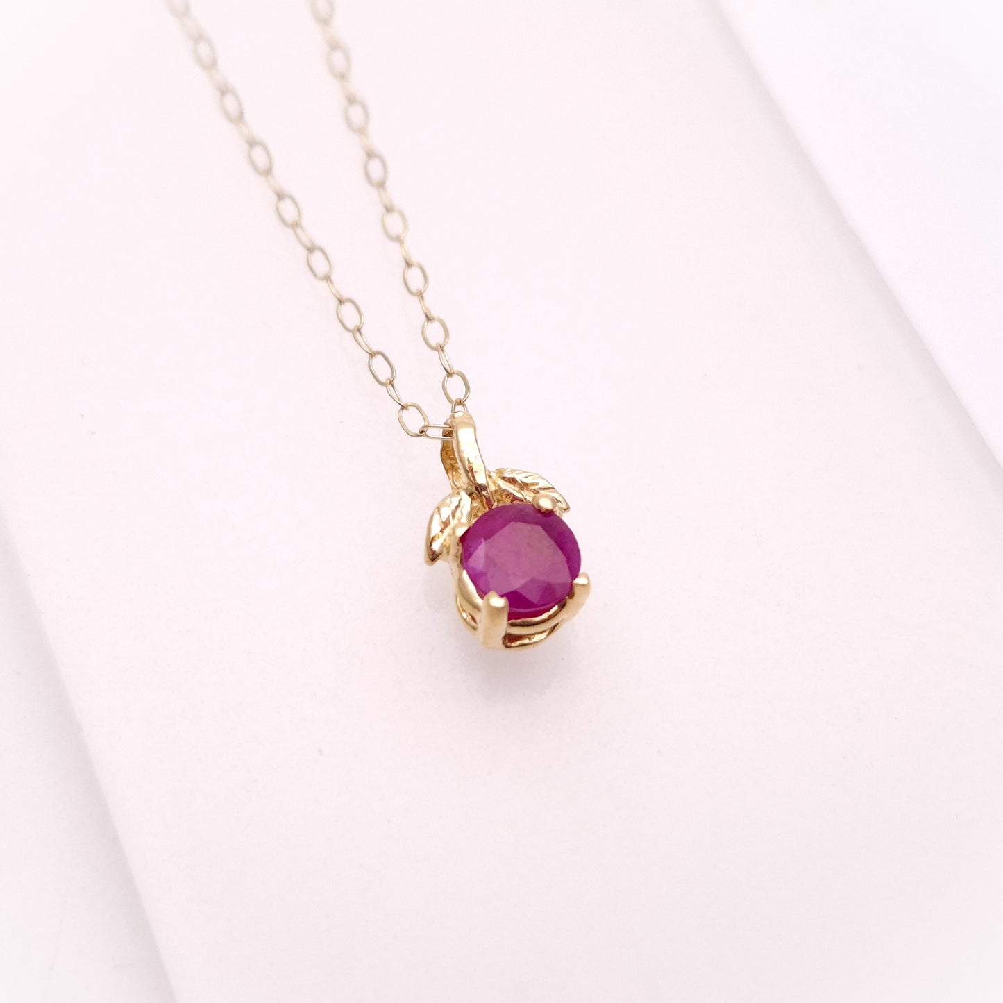 14ct Yellow Gold Leaf Detail Ruby Solitaire Pendant and 9ct Gold Chain
