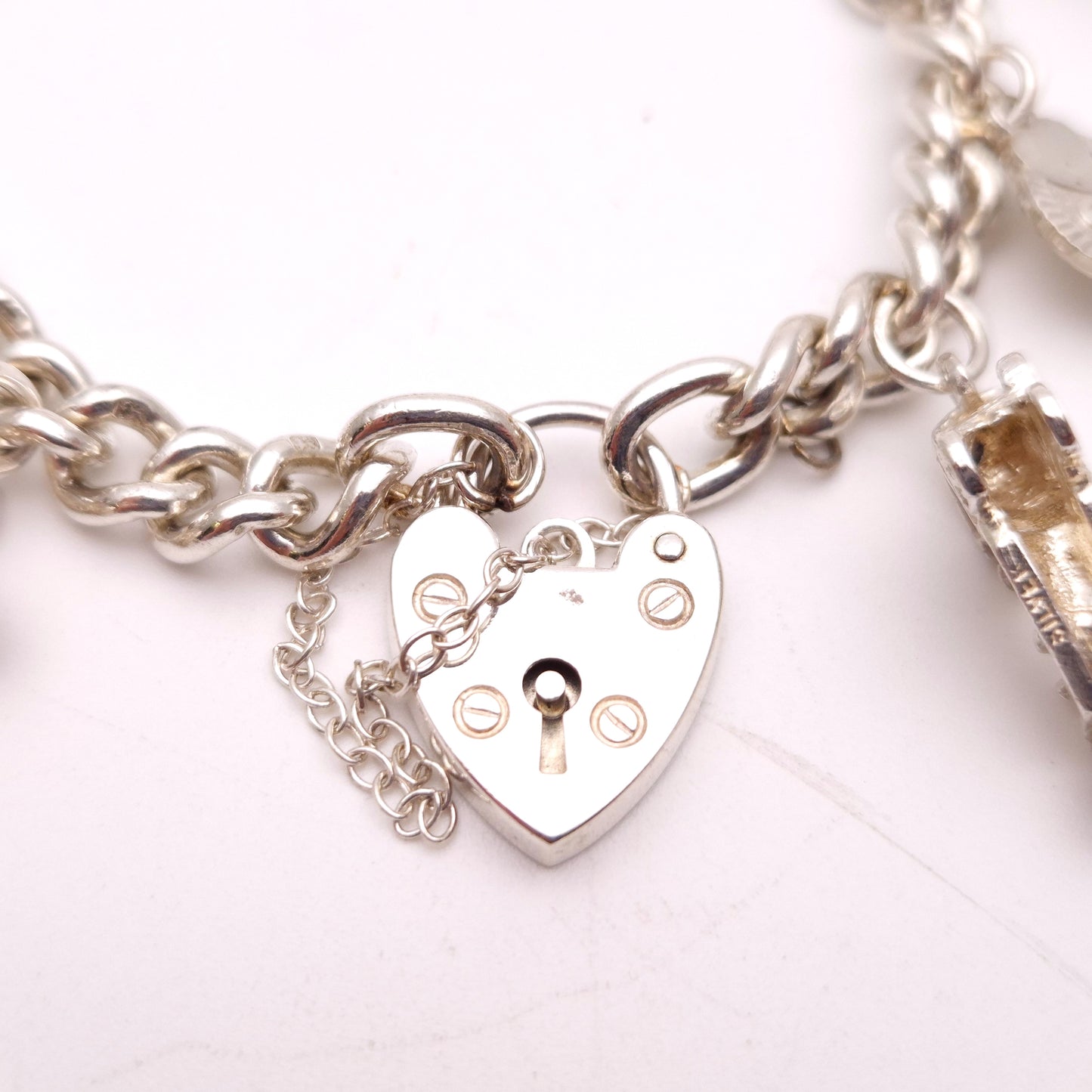 Sterling Silver Multi Charm Heart Padlock Charm Bracelet inc. key,cottage,cherub