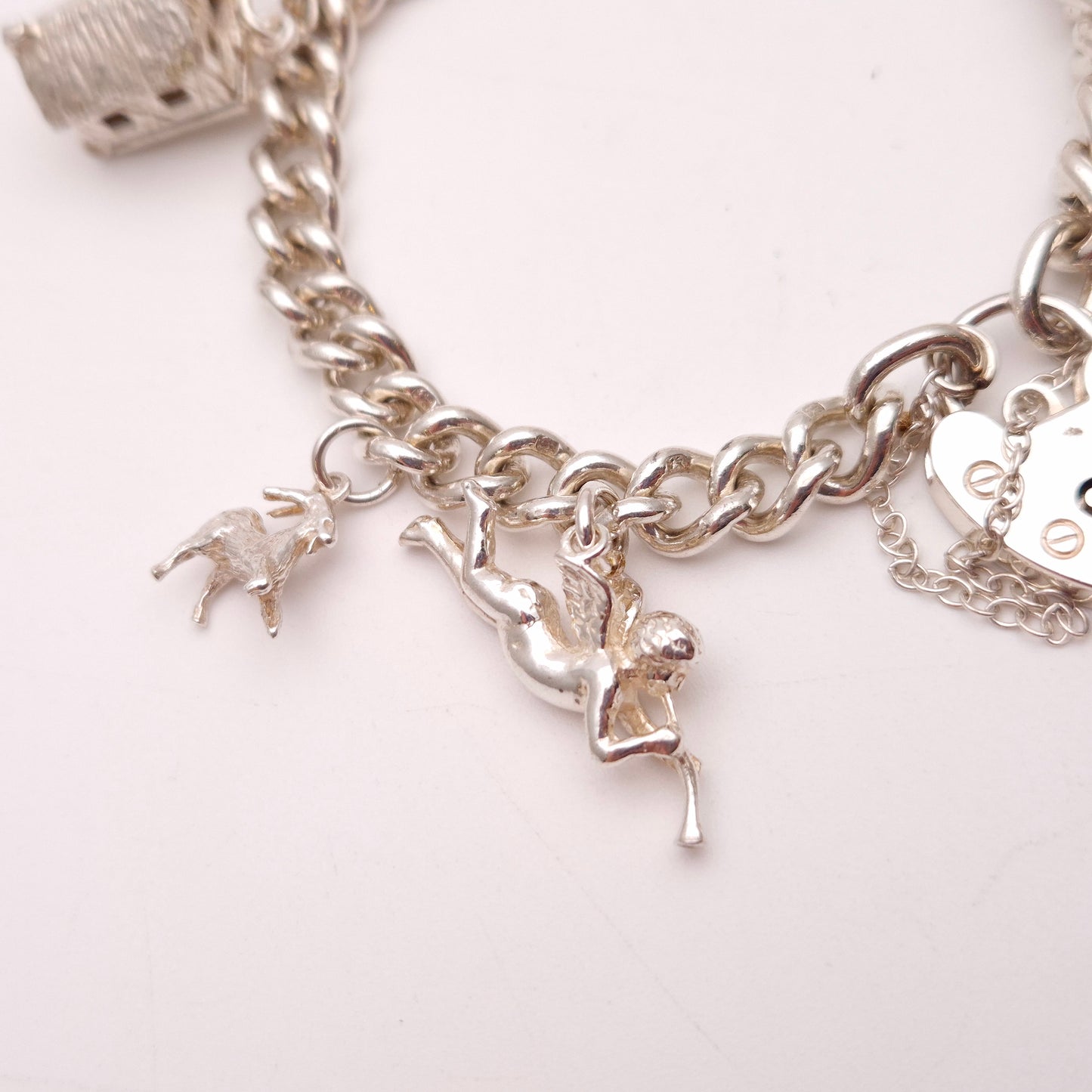 Sterling Silver Multi Charm Heart Padlock Charm Bracelet inc. key,cottage,cherub