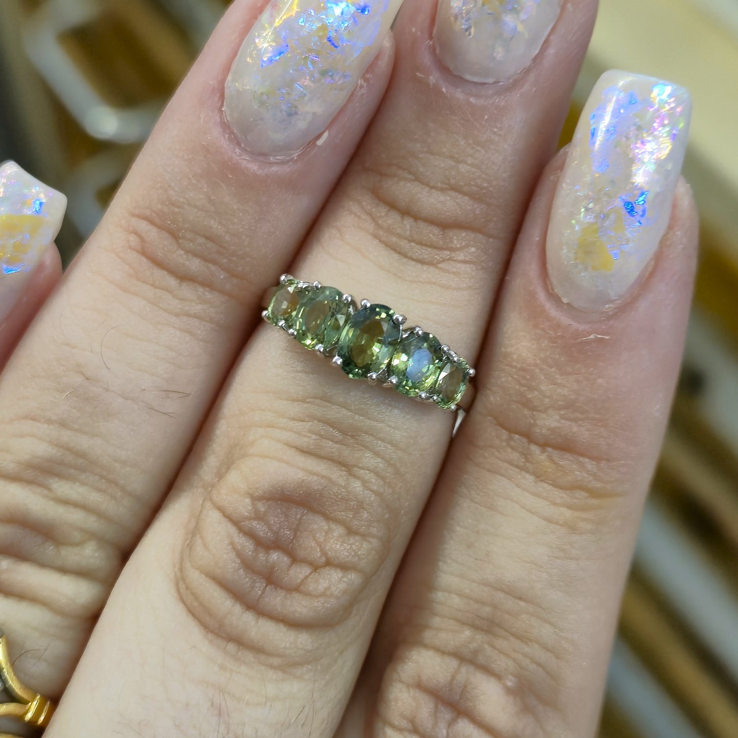 9ct White Gold Five Stone Oval Cut Green Sapphire Row Ring