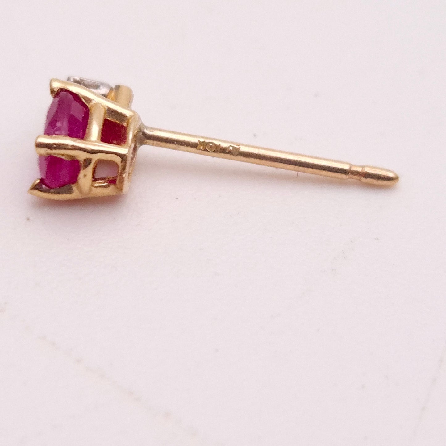 10ct Yellow Gold Oval Cut Ruby and Small Round Diamond Stud Earrings