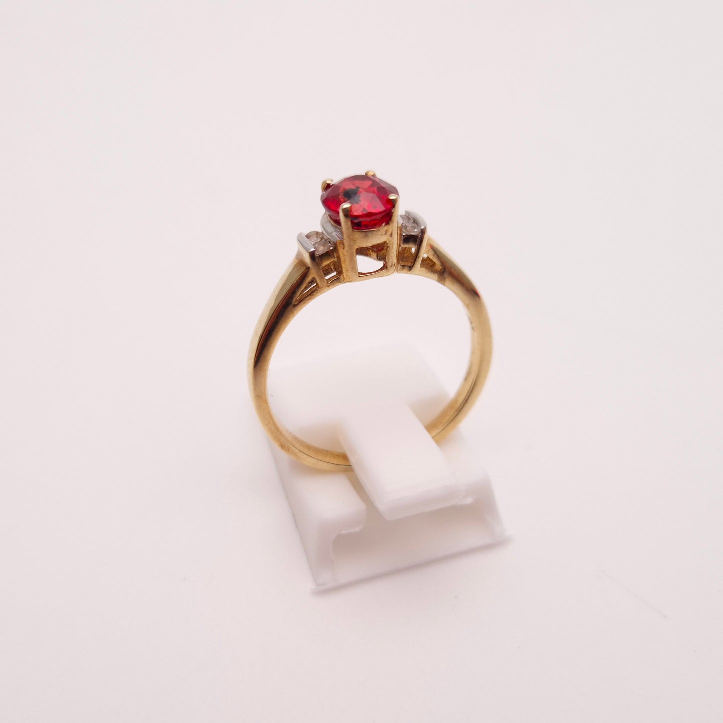9ct Yellow Gold Red Garnet Solitaire and White Topaz Set Shoulders Ring