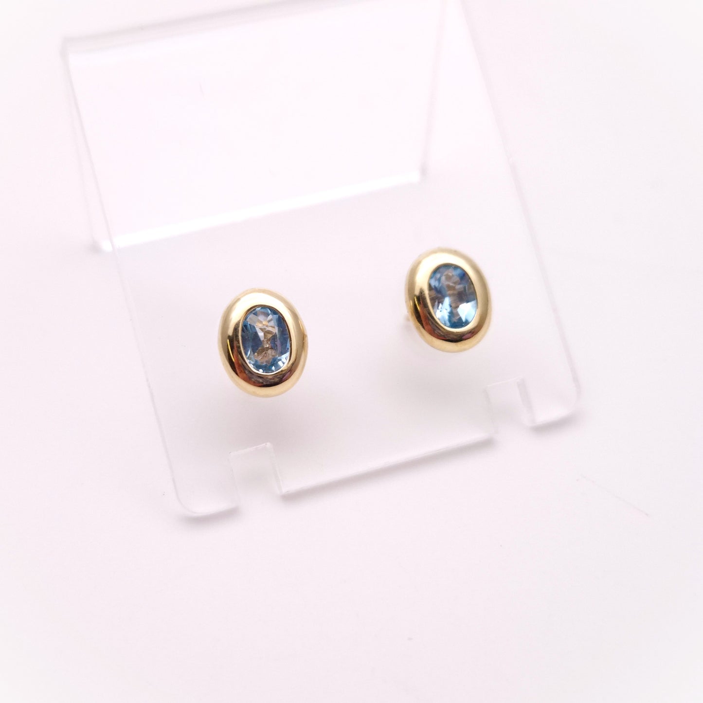 9ct Yellow gold Blue Topaz Bezel Set Stud Earrings