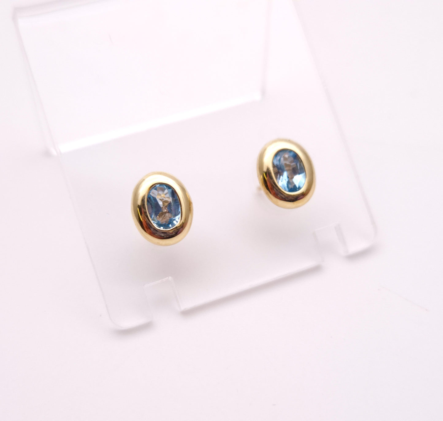 9ct Yellow gold Blue Topaz Bezel Set Stud Earrings