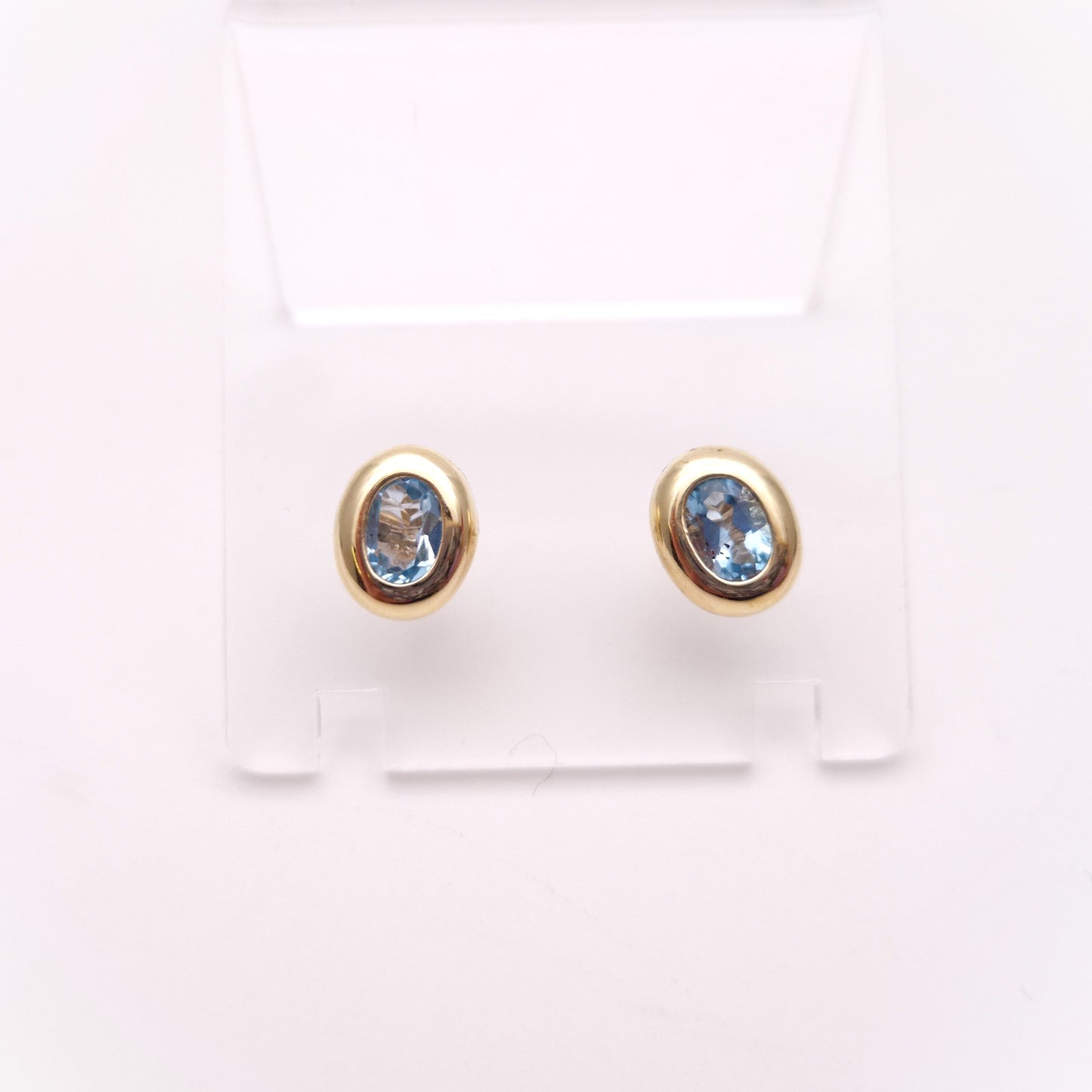 9ct Yellow gold Blue Topaz Bezel Set Stud Earrings