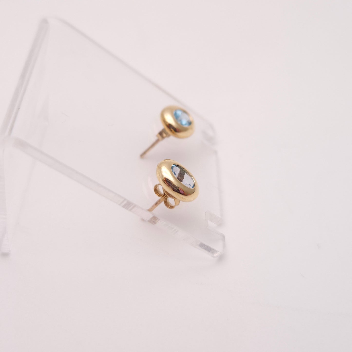 9ct Yellow gold Blue Topaz Bezel Set Stud Earrings