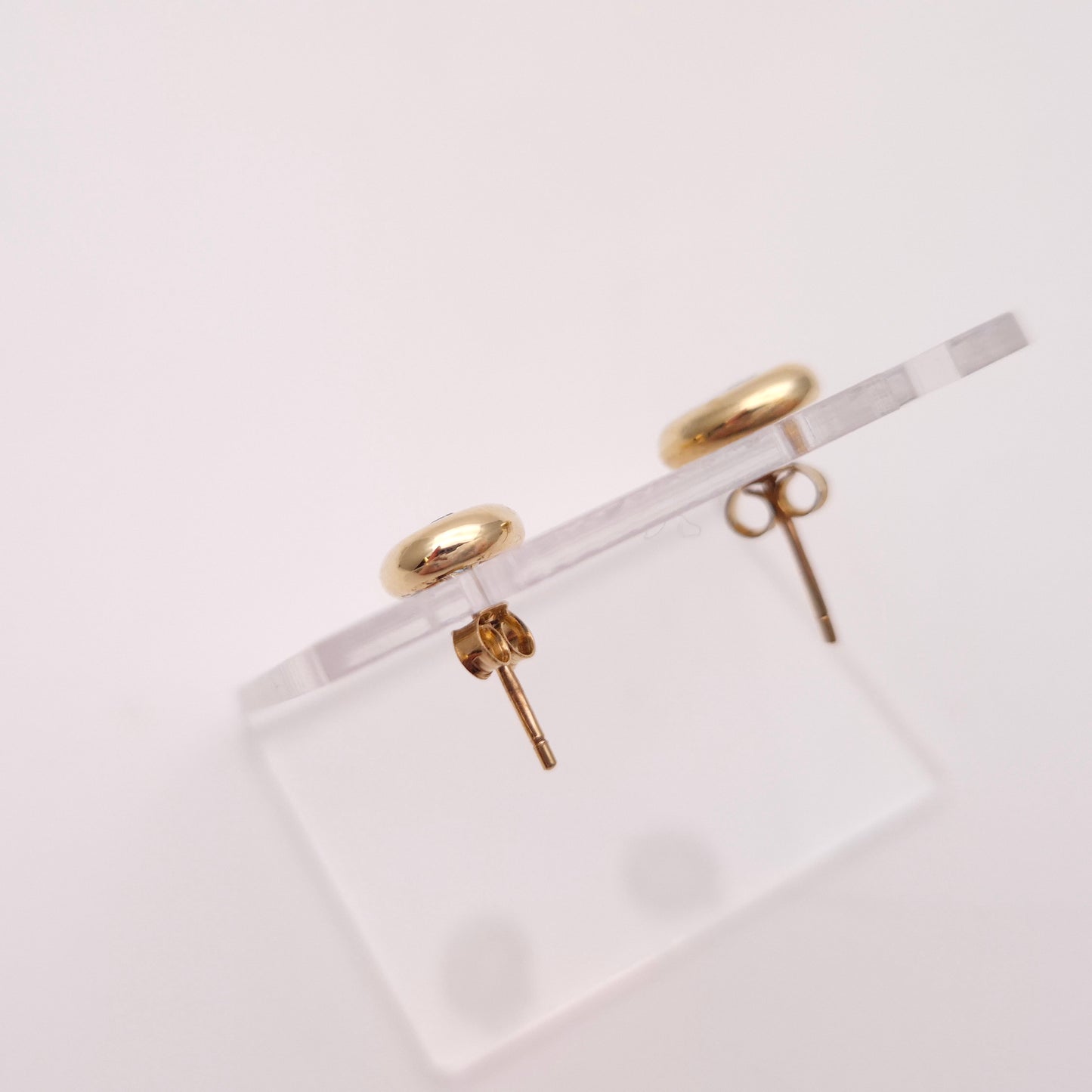 9ct Yellow gold Blue Topaz Bezel Set Stud Earrings