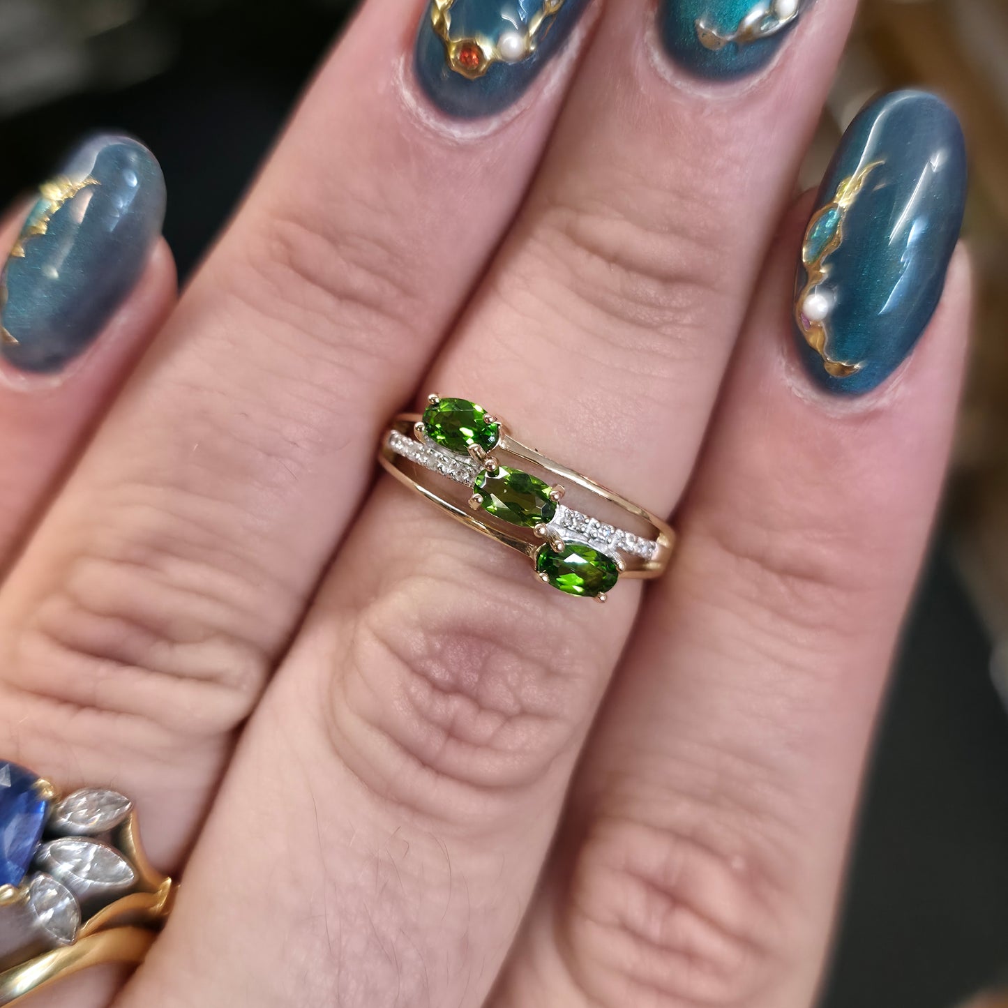 9ct Yellow Gold Three Oval Cut Green Stone (likely Garnet) and Diamond Ring
