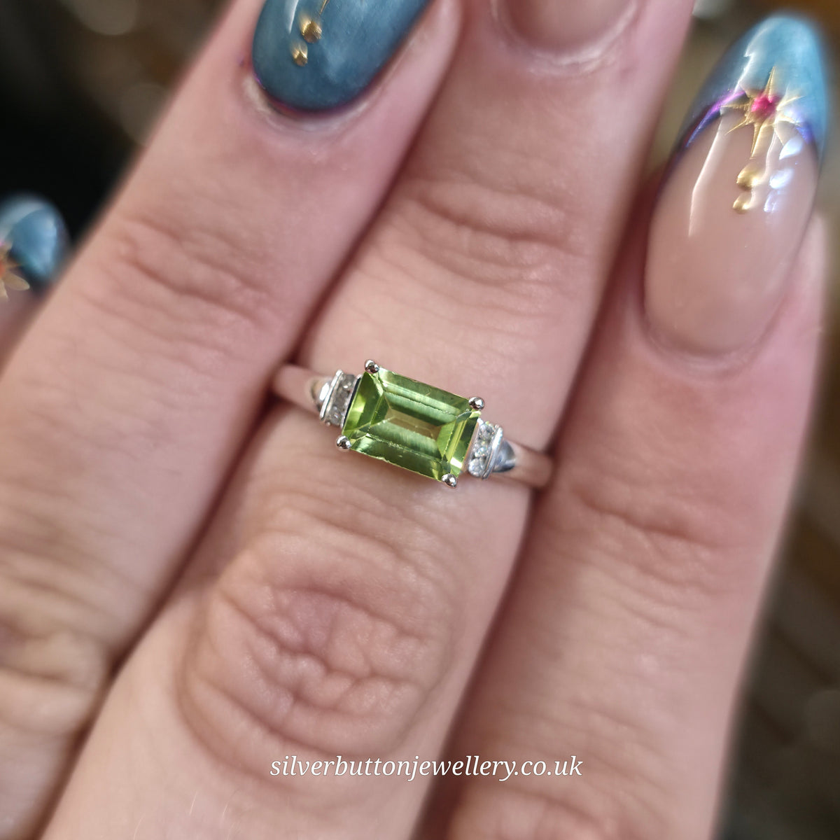 9ct White Gold East-West Set Emerald Cut Peridot And Diamond Ring