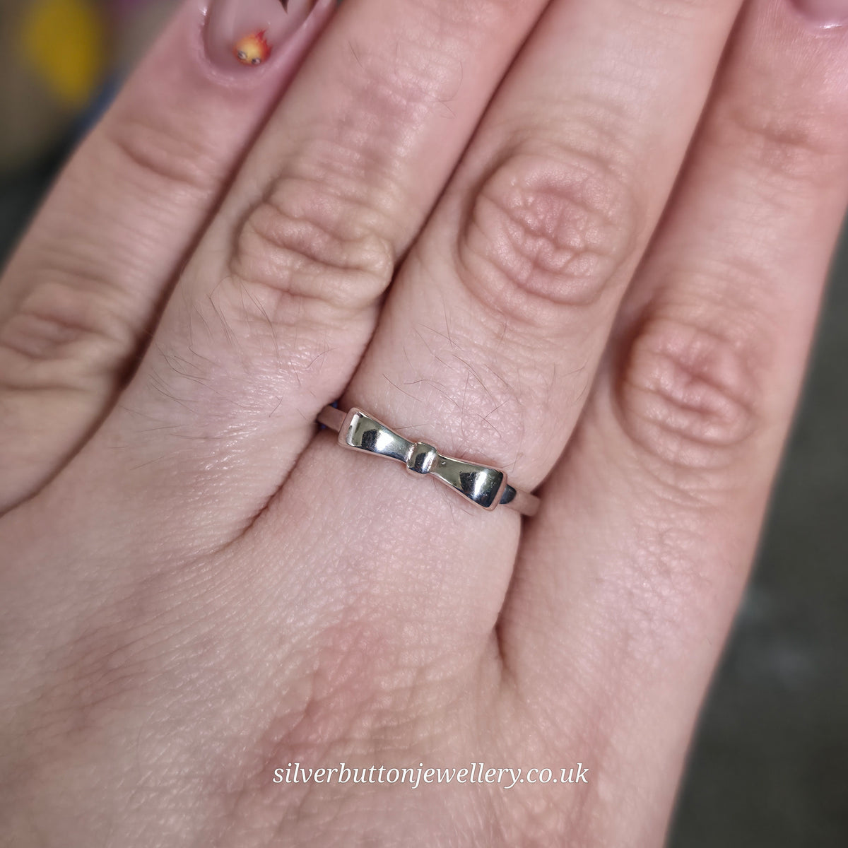 Sterling Silver Bow Profile Polished Finish Ring