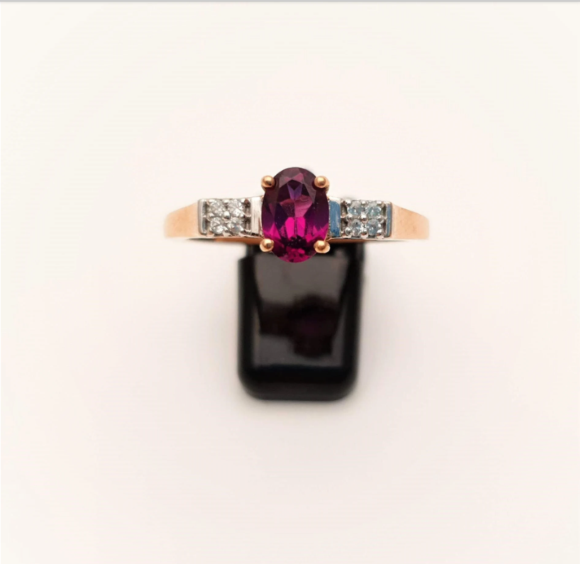 9ct Rose Gold Oval Garnet and white stone solitaire with accents ring