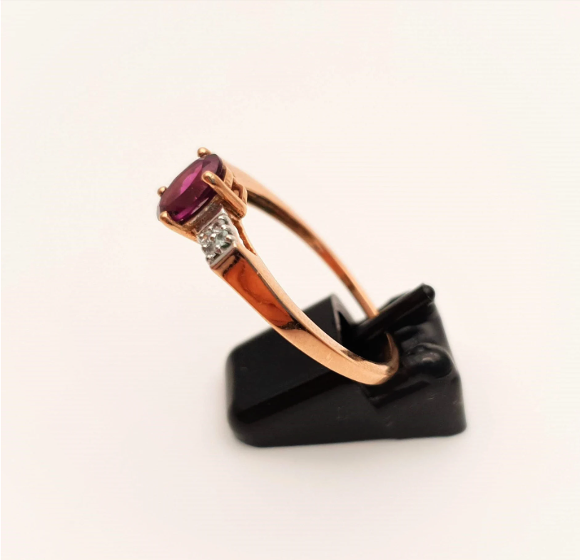 9ct Rose Gold Oval Garnet and white stone solitaire with accents ring