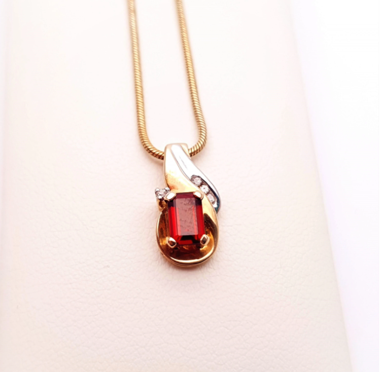 9ct yellow gold garnet and diamond two-tone pendant and chain necklace.