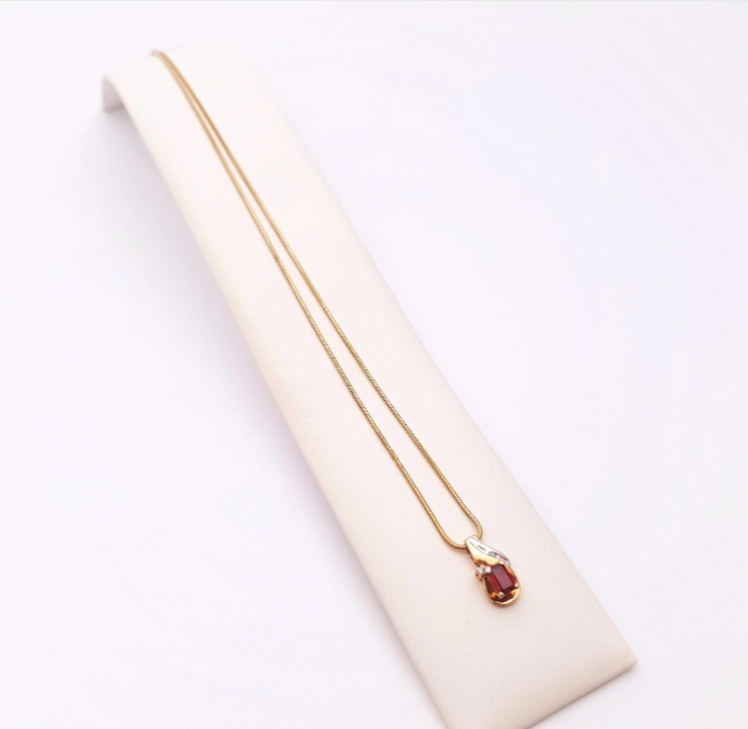 9ct yellow gold garnet and diamond two-tone pendant and chain necklace.