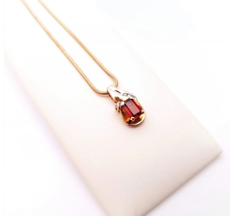 9ct yellow gold garnet and diamond two-tone pendant and chain necklace.