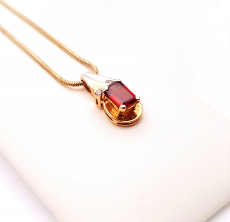 9ct yellow gold garnet and diamond two-tone pendant and chain necklace.