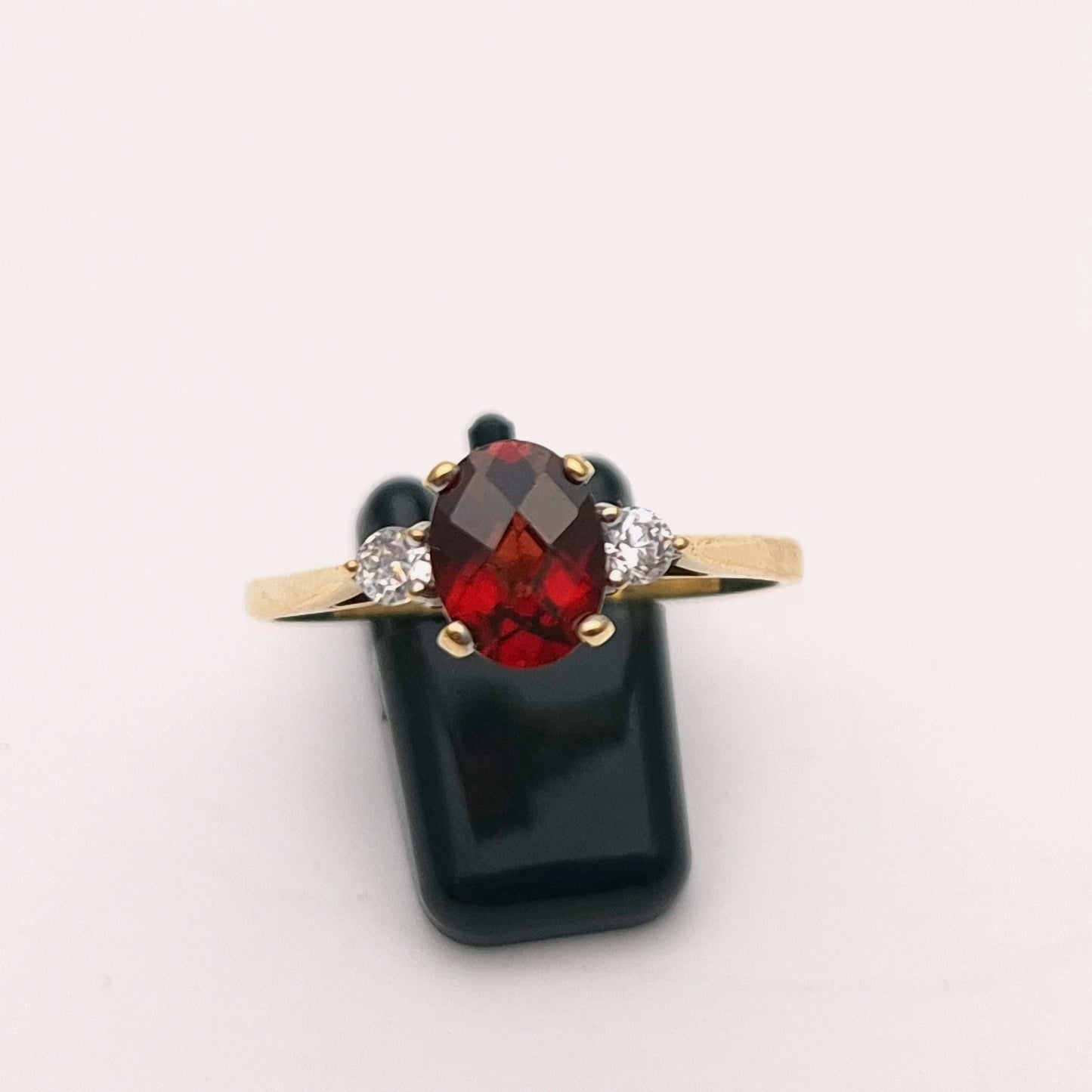 9ct Yellow Gold Garnet and Cubic Zirconia Three stone ring