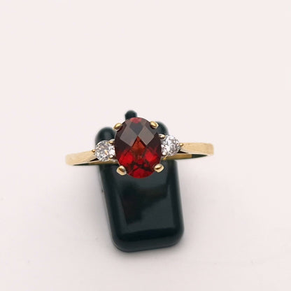 9ct Yellow Gold Garnet and Cubic Zirconia Three stone ring