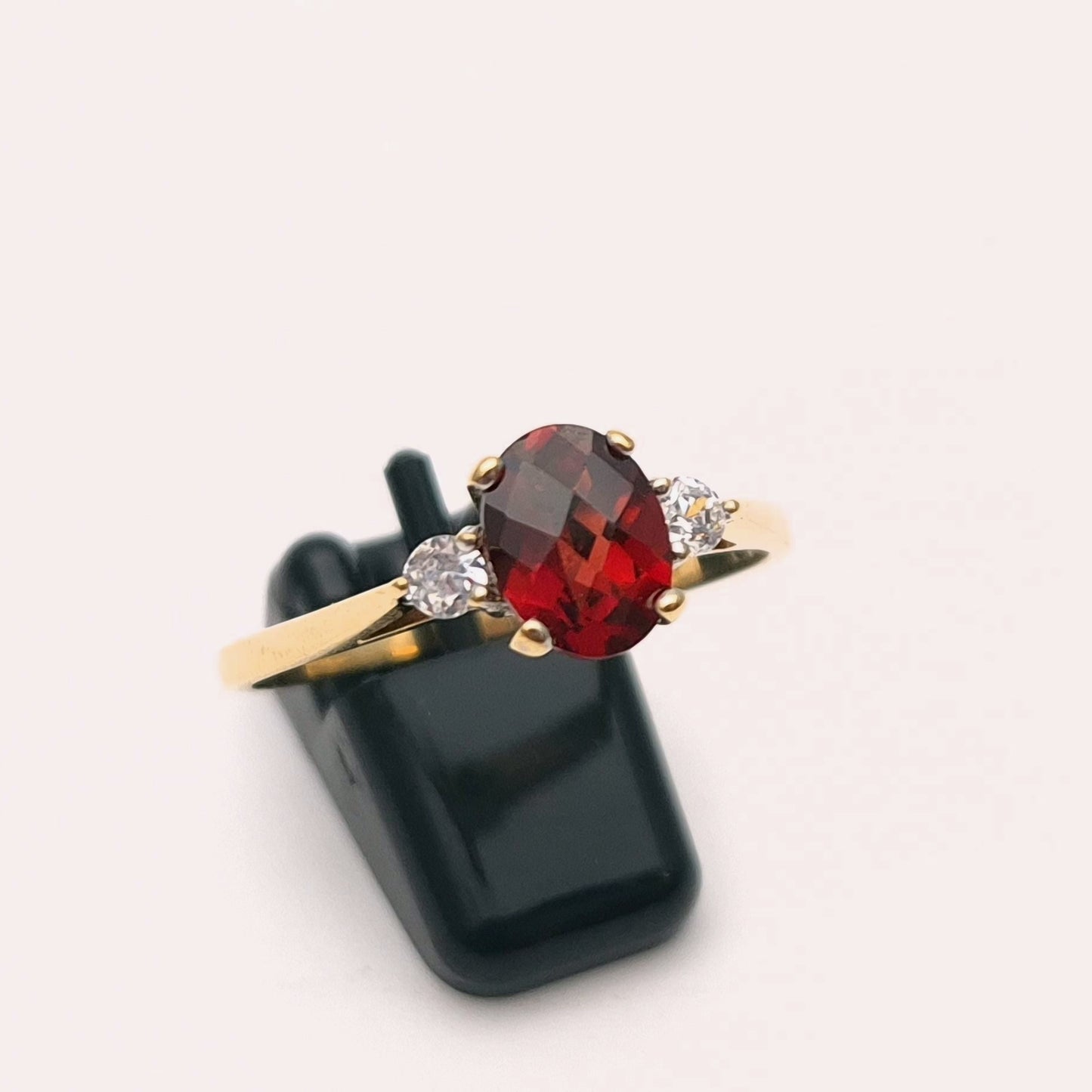 9ct Yellow Gold Garnet and Cubic Zirconia Three stone ring