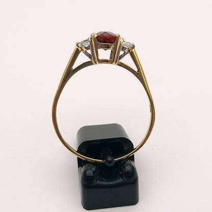 9ct Yellow Gold Garnet and Cubic Zirconia Three stone ring