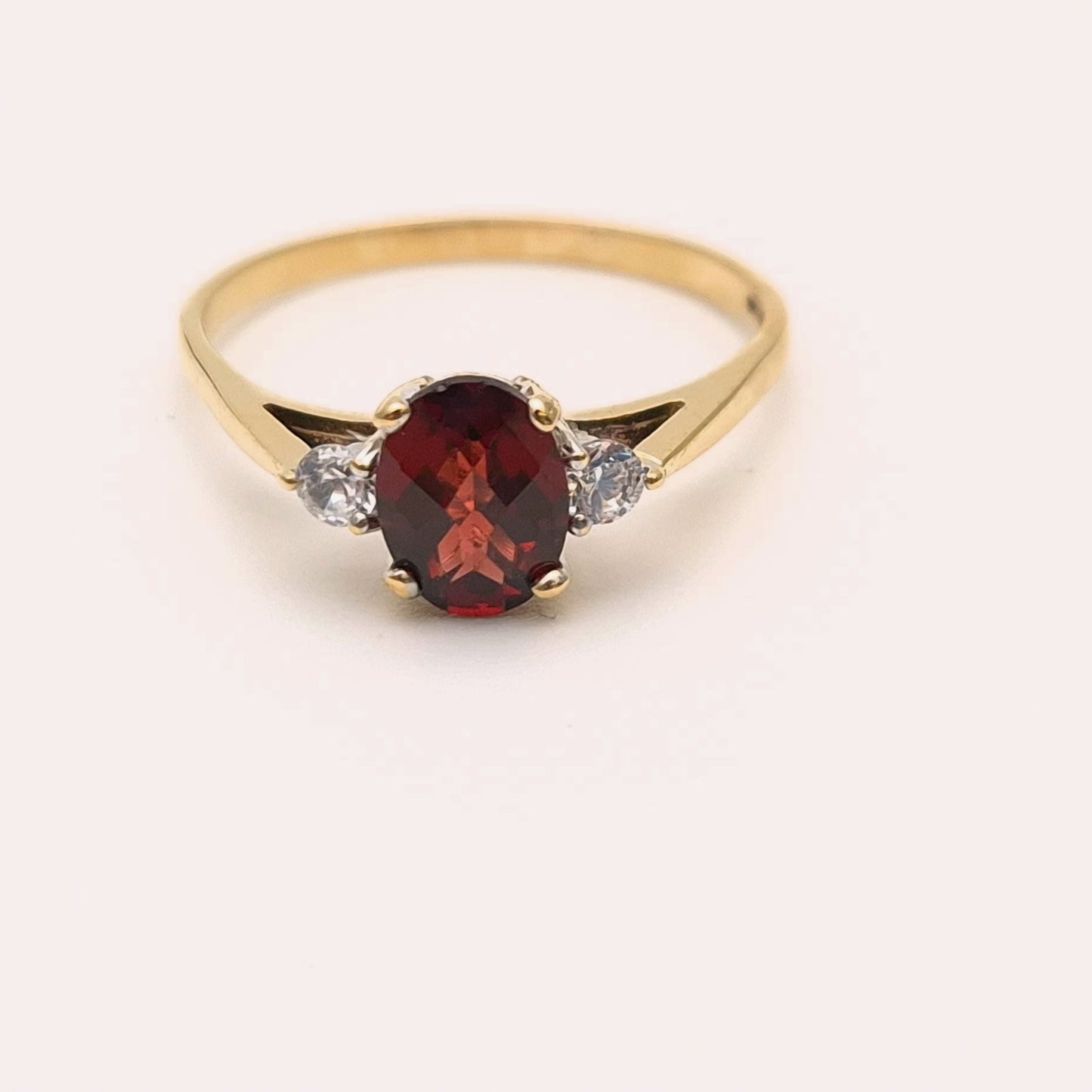 9ct Yellow Gold Garnet and Cubic Zirconia Three stone ring