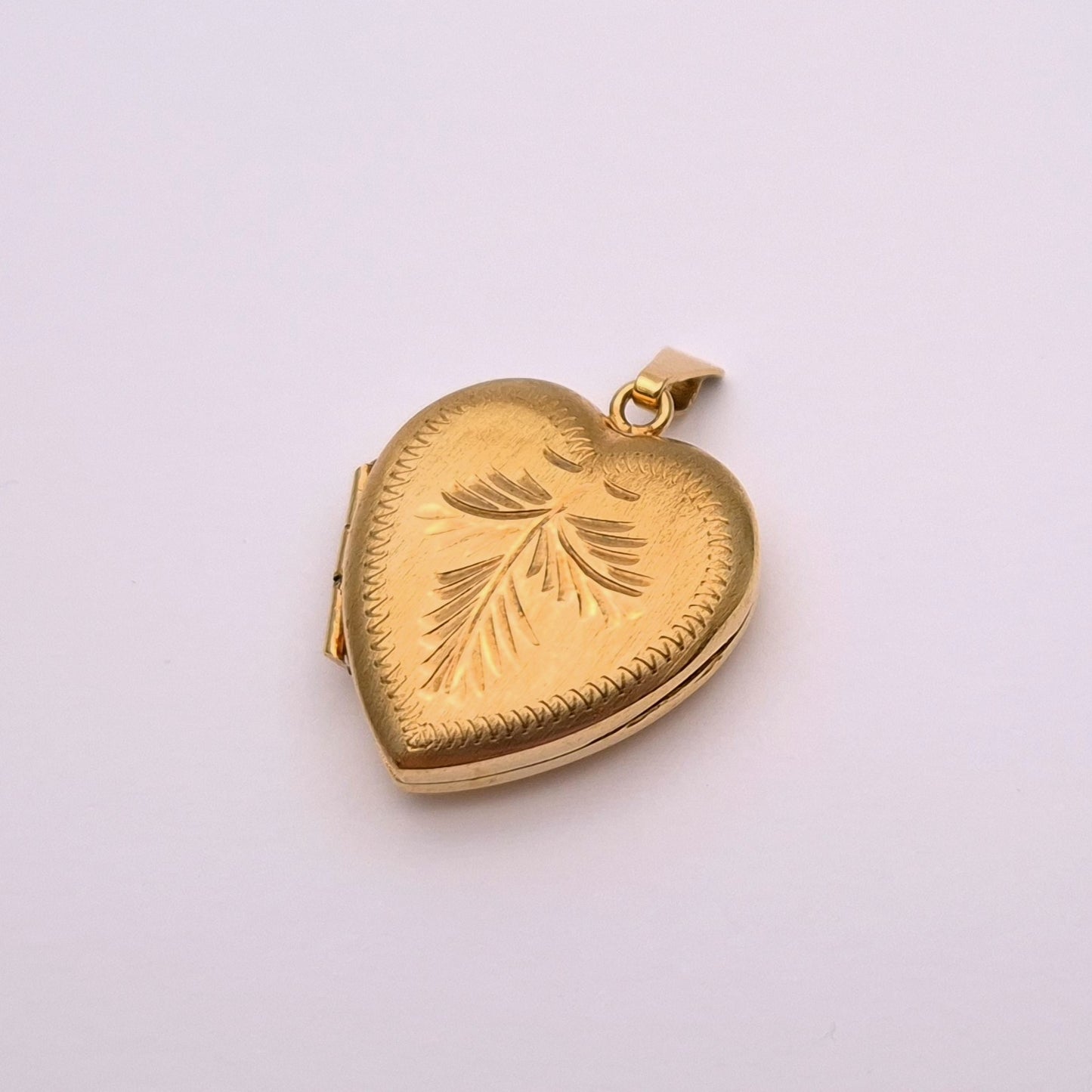 9ct yellow gold brushed effect heart shaped locket