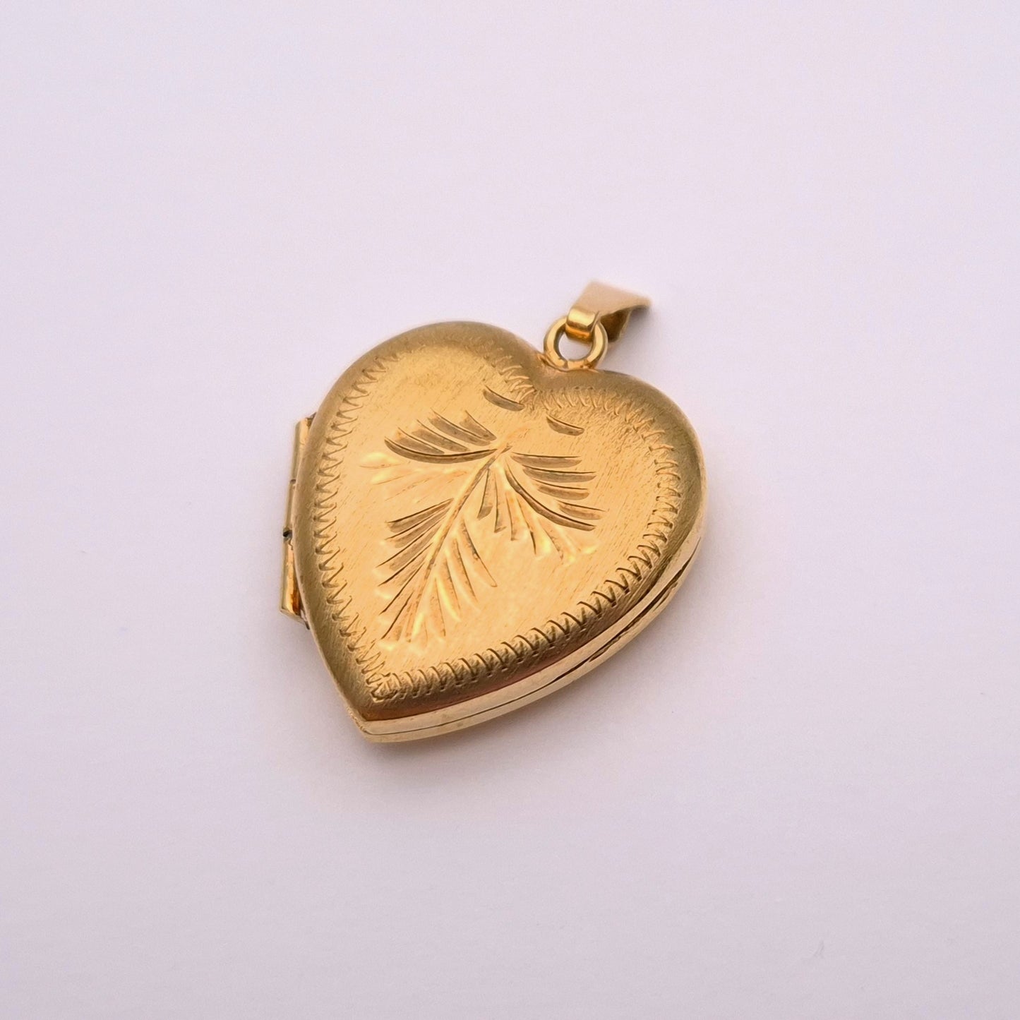 9ct yellow gold brushed effect heart shaped locket
