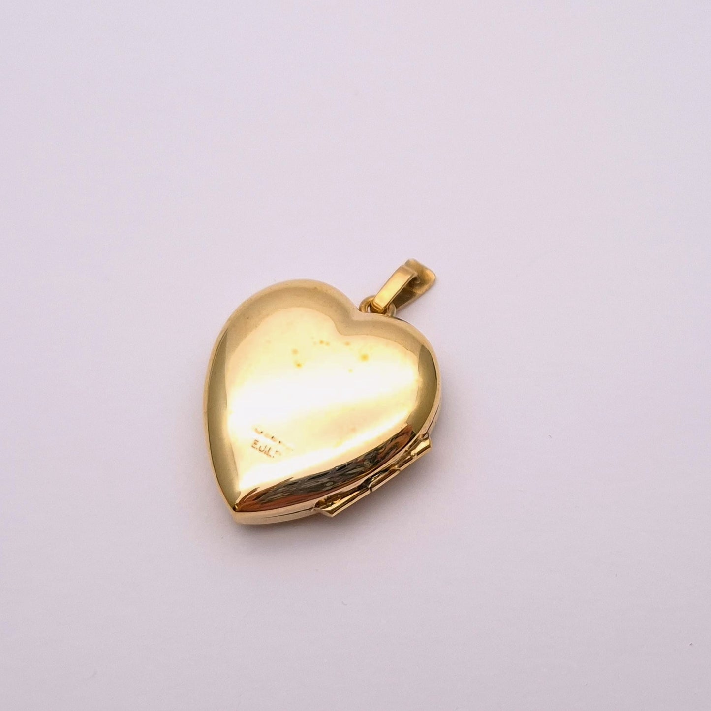 9ct yellow gold brushed effect heart shaped locket