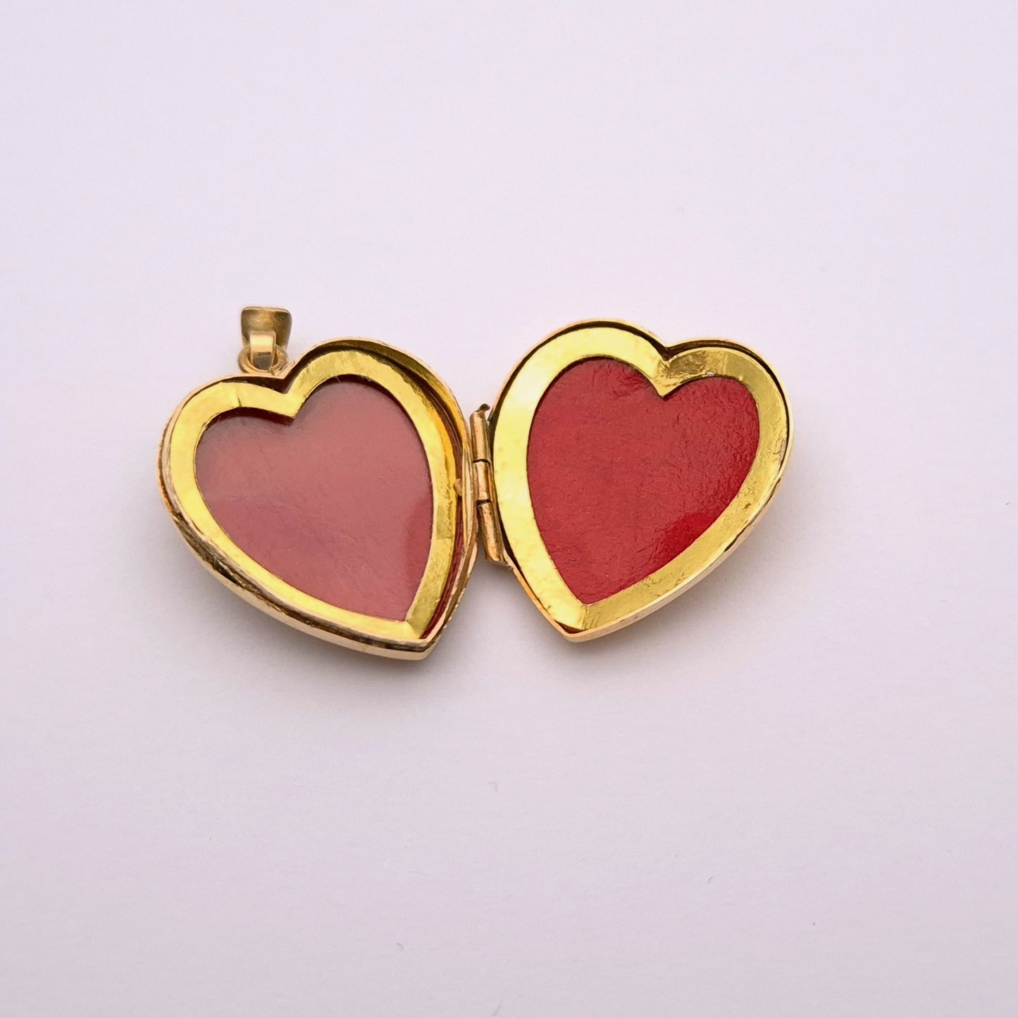 9ct yellow gold brushed effect heart shaped locket