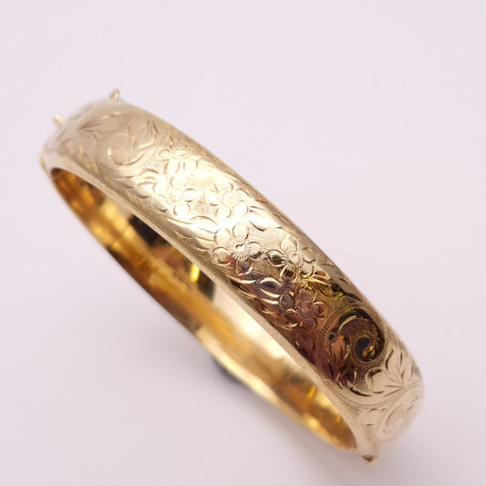 9ct yellow gold half hoop floral patterned large bangle