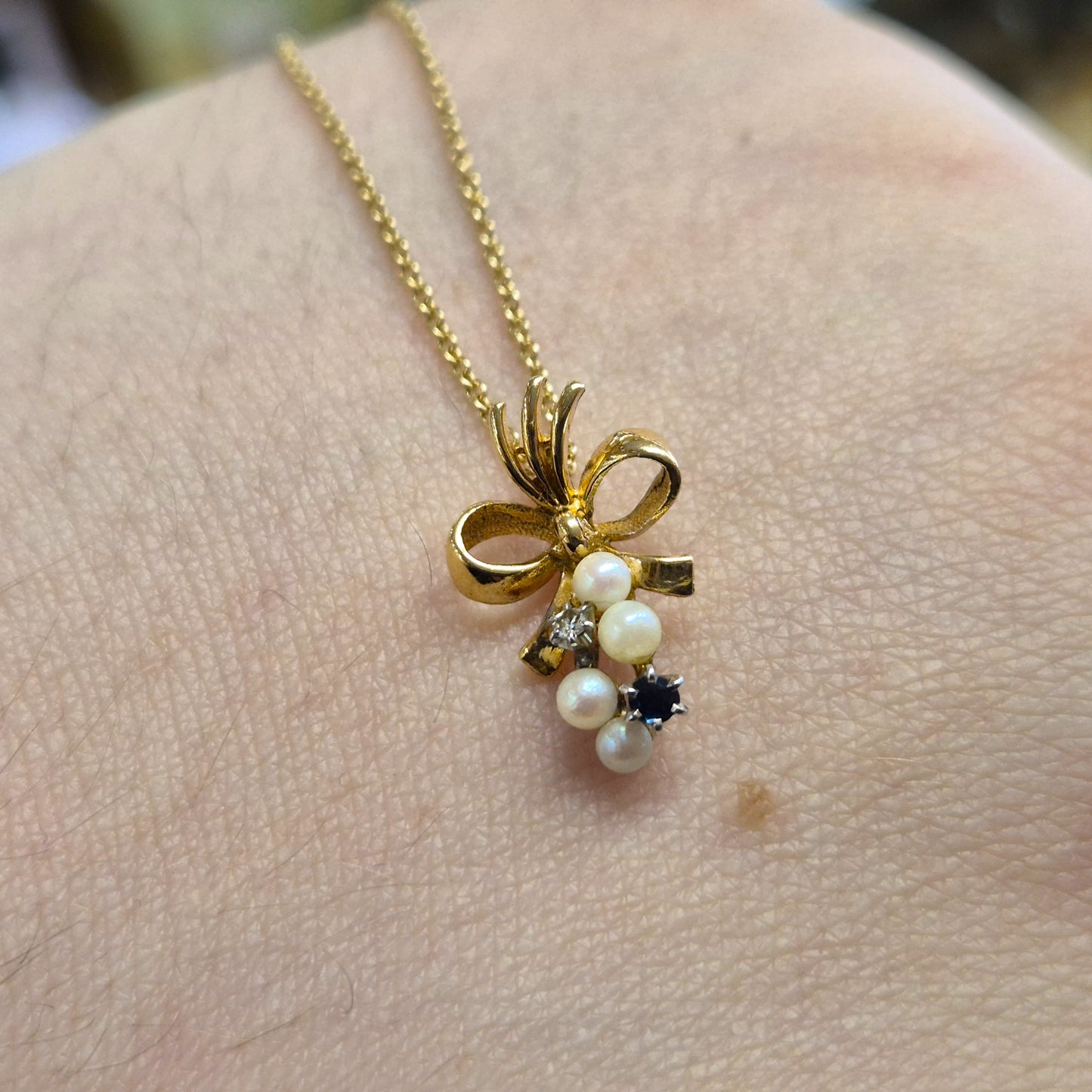 9ct Yellow Gold Sapphire , Diamond and Pearl Bow Pendant and chain Necklace