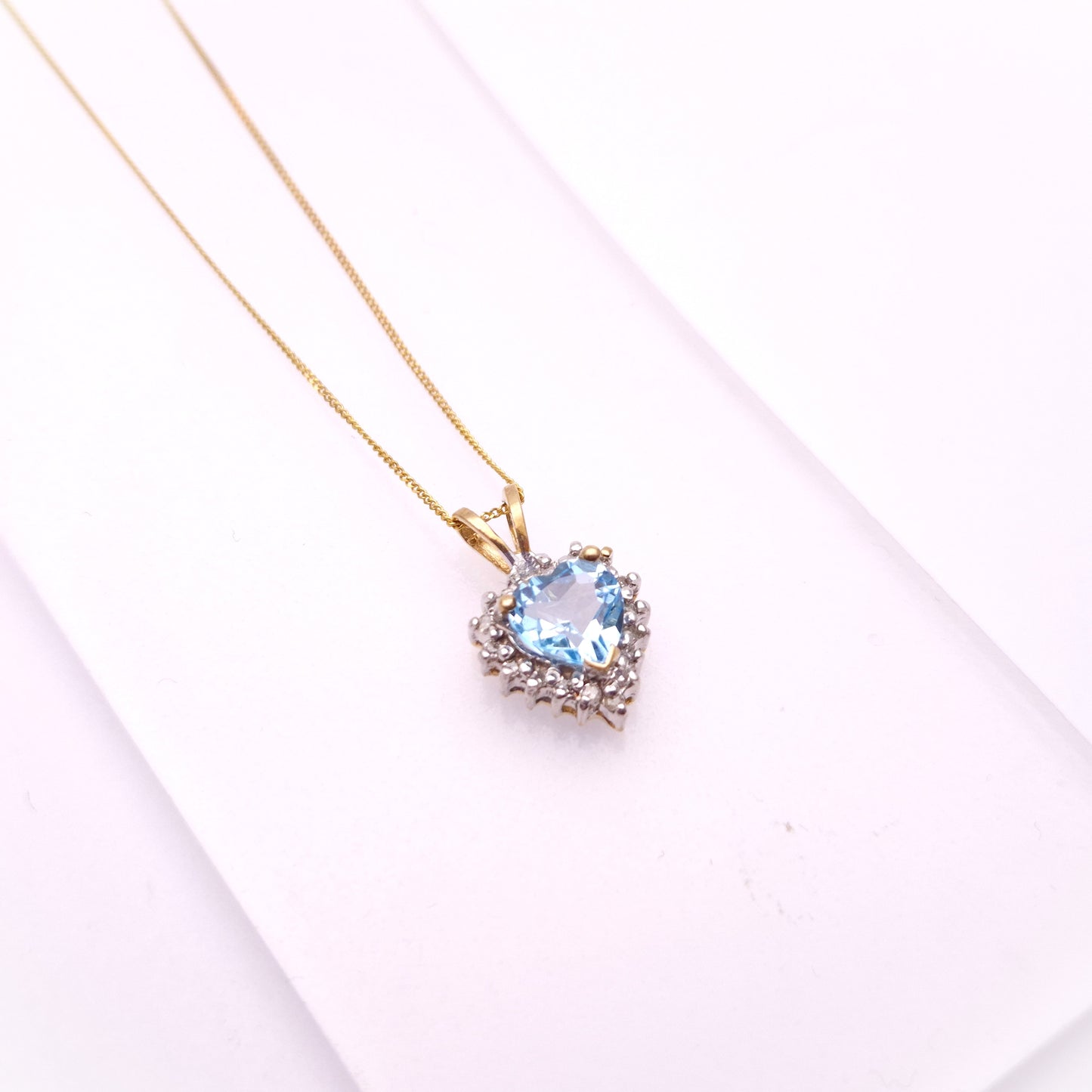 9ct Yellow Gold Blue Topaz and diamond Heart Shaped Cluster Pendant and Chain necklace