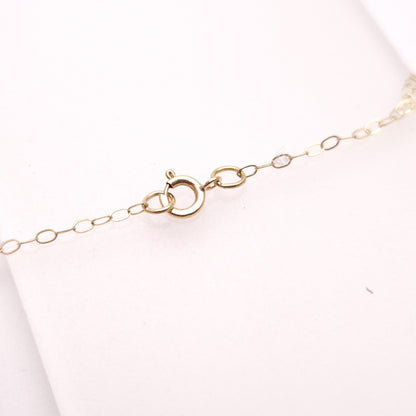 14ct Yellow Gold Leaf Detail Ruby Solitaire Pendant and 9ct Gold Chain