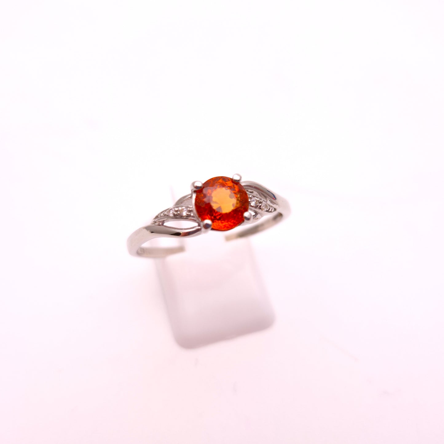 9ct White Gold Spessartite Garnet and White Stone Ring