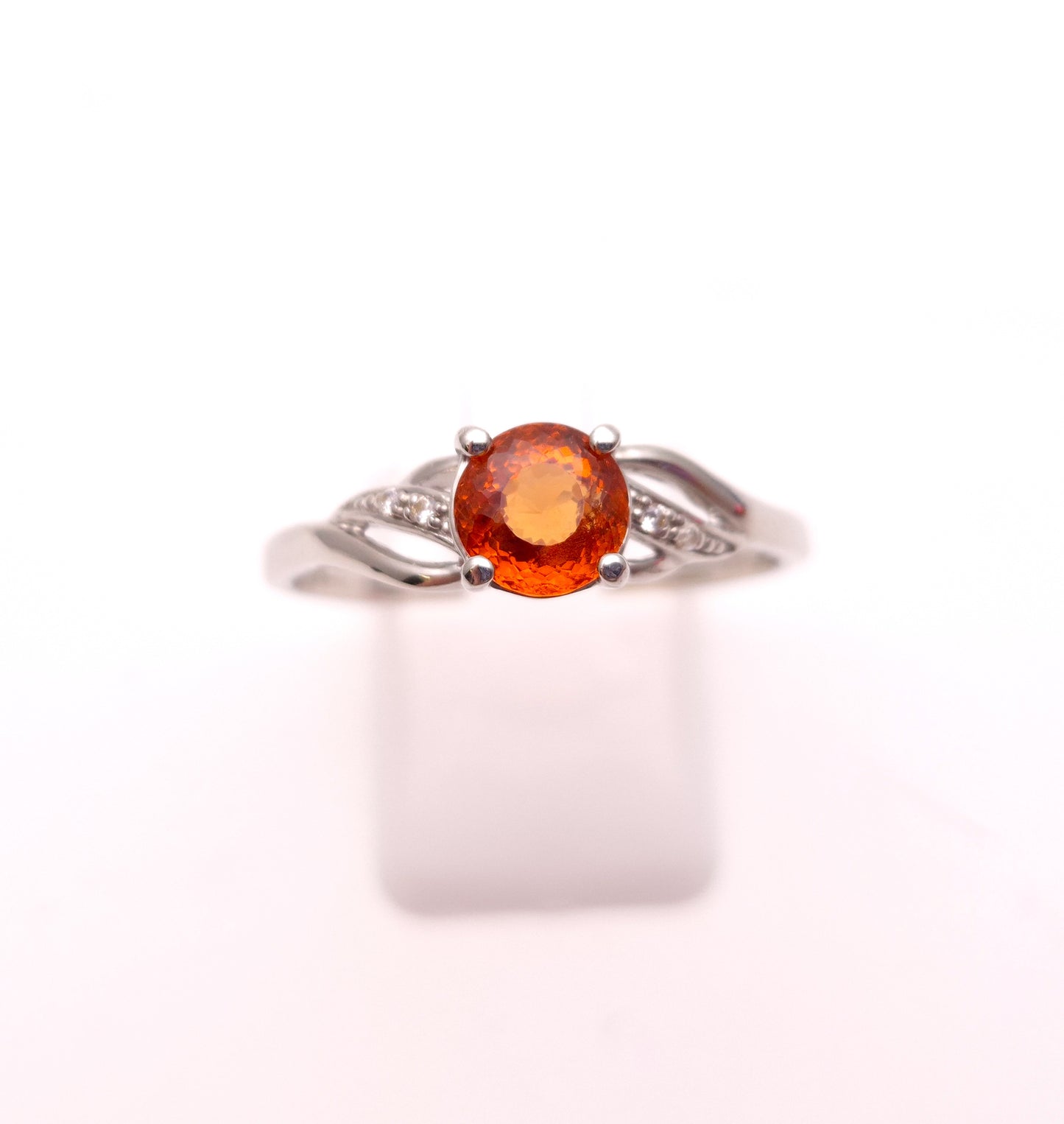 9ct White Gold Spessartite Garnet and White Stone Ring