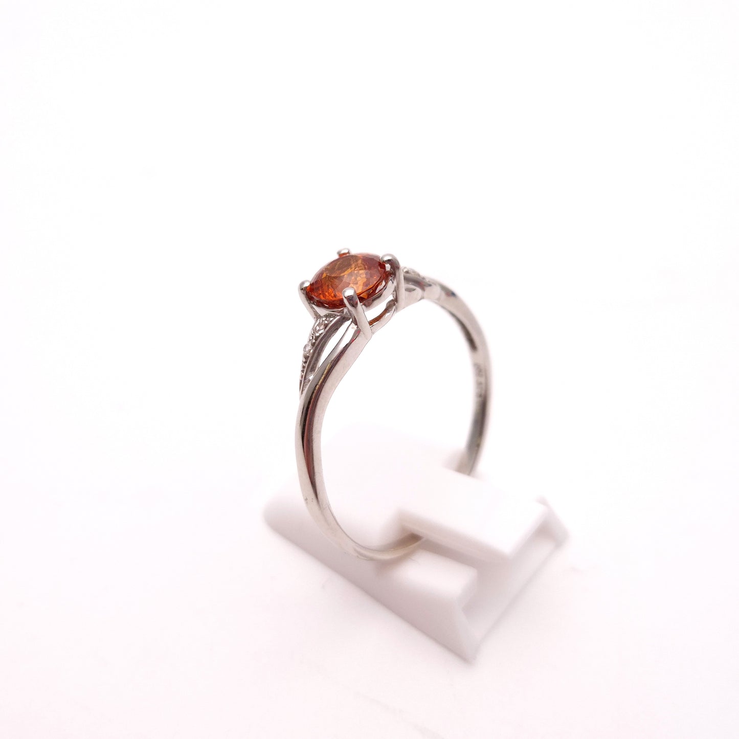 9ct White Gold Spessartite Garnet and White Stone Ring