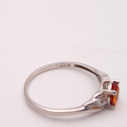 9ct White Gold Spessartite Garnet and White Stone Ring
