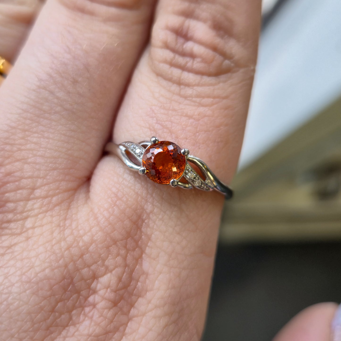 9ct White Gold Spessartite Garnet and White Stone Ring