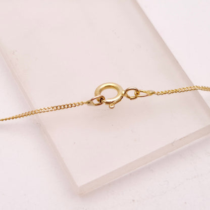 9ct Yellow Gold Ruby and Onyx Ring / Donut Pendant and Chain Necklace
