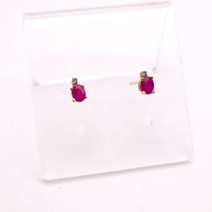 10ct Yellow Gold Oval Cut Ruby and Small Round Diamond Stud Earrings