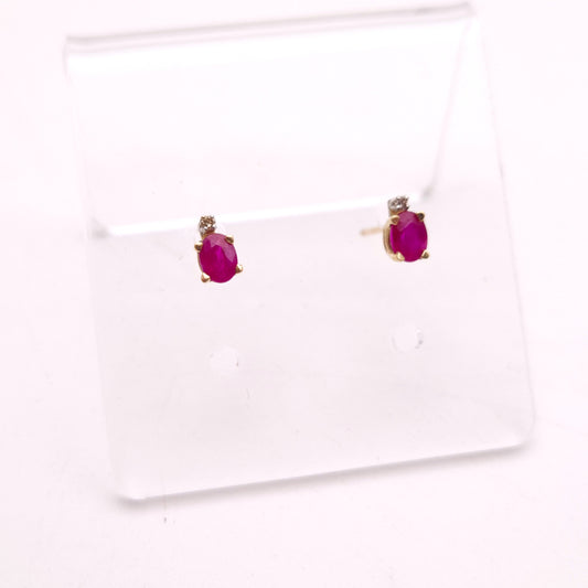 10ct Yellow Gold Oval Cut Ruby and Small Round Diamond Stud Earrings