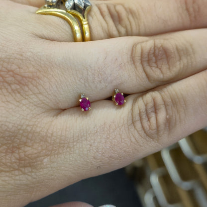 10ct Yellow Gold Oval Cut Ruby and Small Round Diamond Stud Earrings